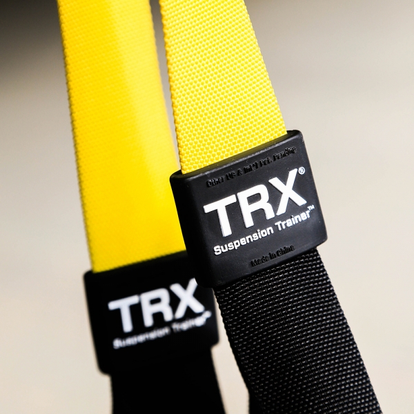 (Photo:) TRX - Bodyweight exercise develops strength, balance, flexibility and core stability simultaneously. It requires the use of the TRX suspension trainer
